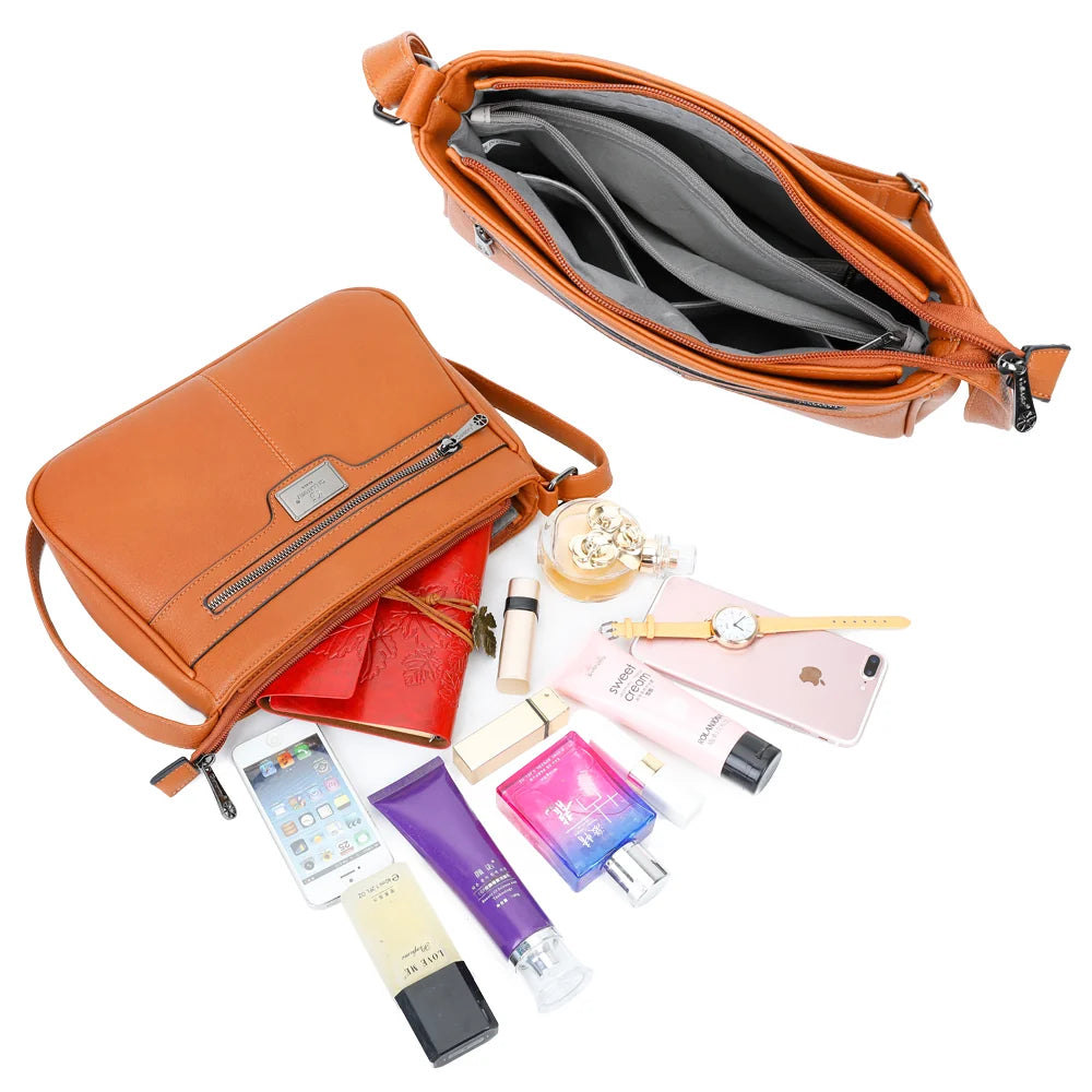 Intérieur du Sora Urban marron : plusieurs compartiments zippés pour téléphone, clés et maquillage – réf. Z-83016