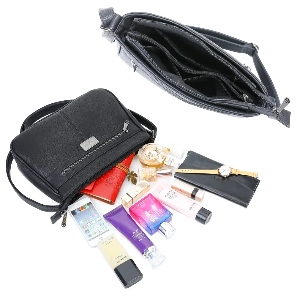Intérieur du Sora Urban noir : plusieurs compartiments zippés pour téléphone, clés et maquillage – réf. Z-83016