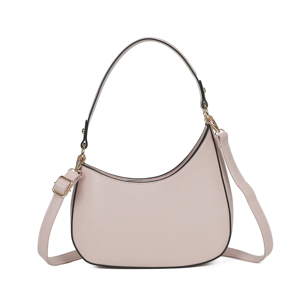 Dos du sac Tereza rose, ligne épurée et anse d’épaule fixée par des anneaux dorés – réf. R-1957