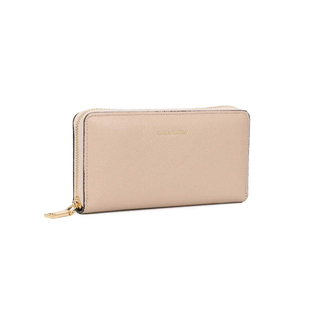Thaïs Zip taupe vu de trois-quarts : silhouette longue et épurée, zip doré qui fait le tour du portefeuille