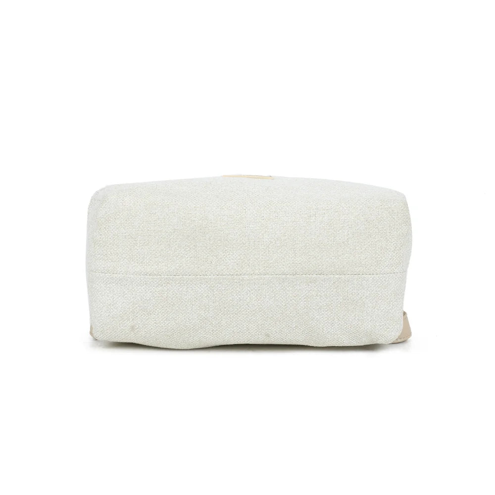 Dessous de l’Urbania beige/taupe : une base en toile texturée qui prolonge la ligne épurée du sac – réf. JC-53007-1