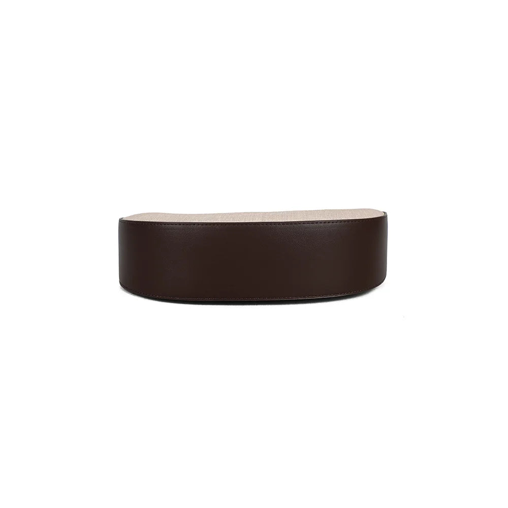 Dessous du Vena taupe/coffee : base arrondie bordée de finitions synthétiques assorties à l’anse – réf. A-9161