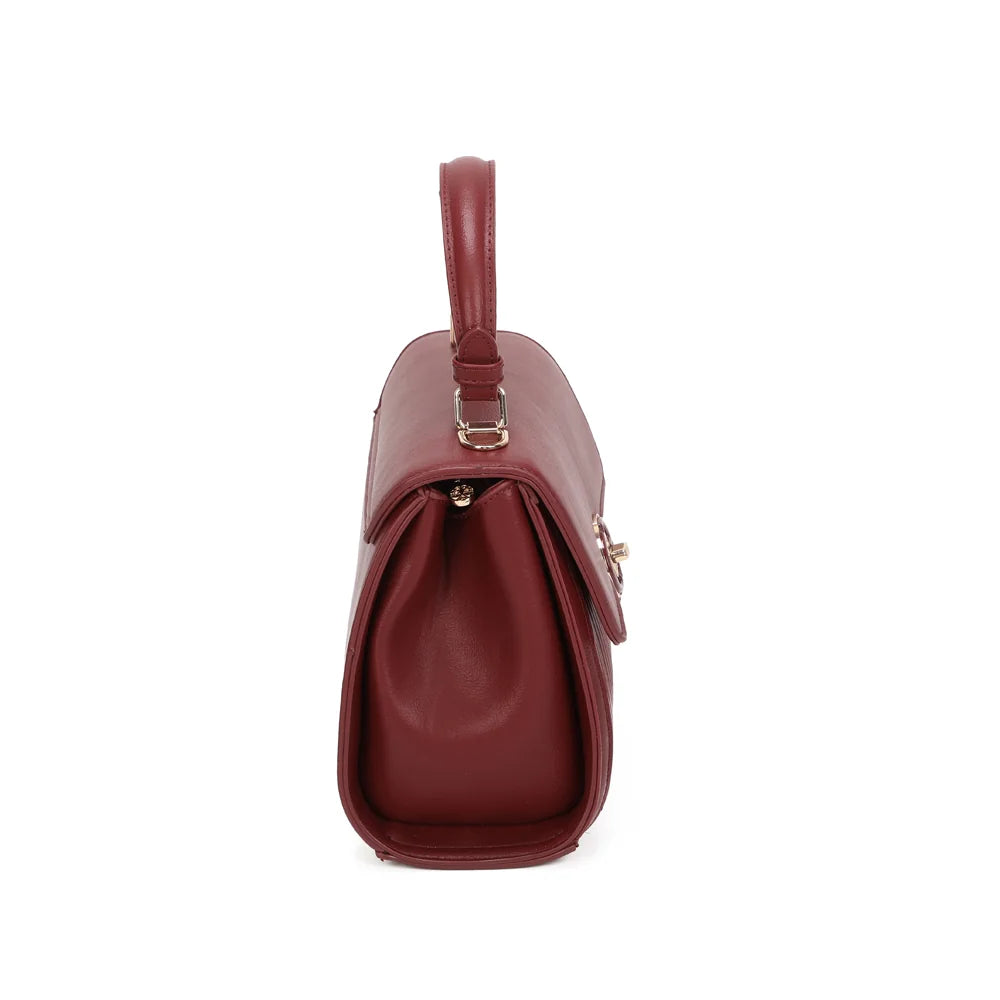 Profil du sac Véra rouge foncé : soufflet latéral lisse et silhouette compacte bien structurée – réf. R-1969-1