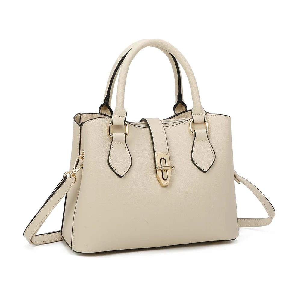 Vérita beige vu de trois quarts : silhouette structurée et pattes de poignées en pointe – réf. DQ-8663