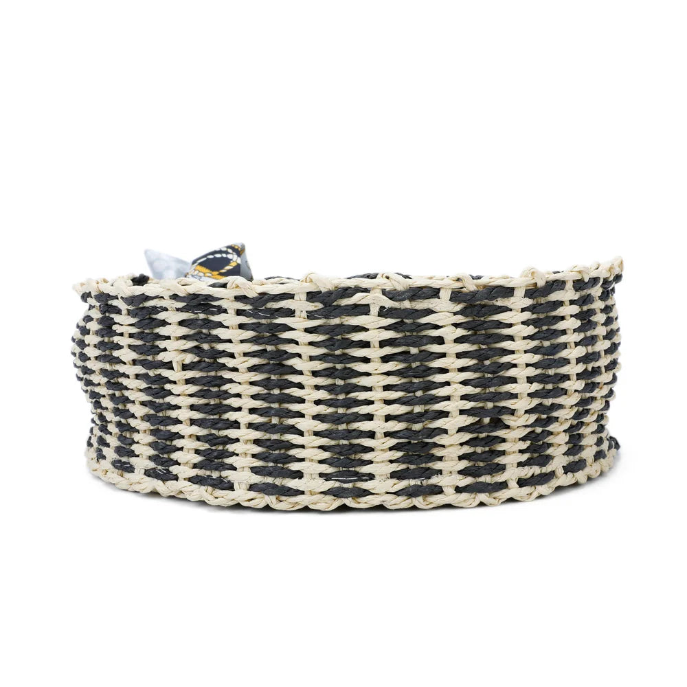 Dessous du Zéphyr noir/beige : tranche en fibre tressée qui fait tout le tour du sac rond – réf. MG-15002